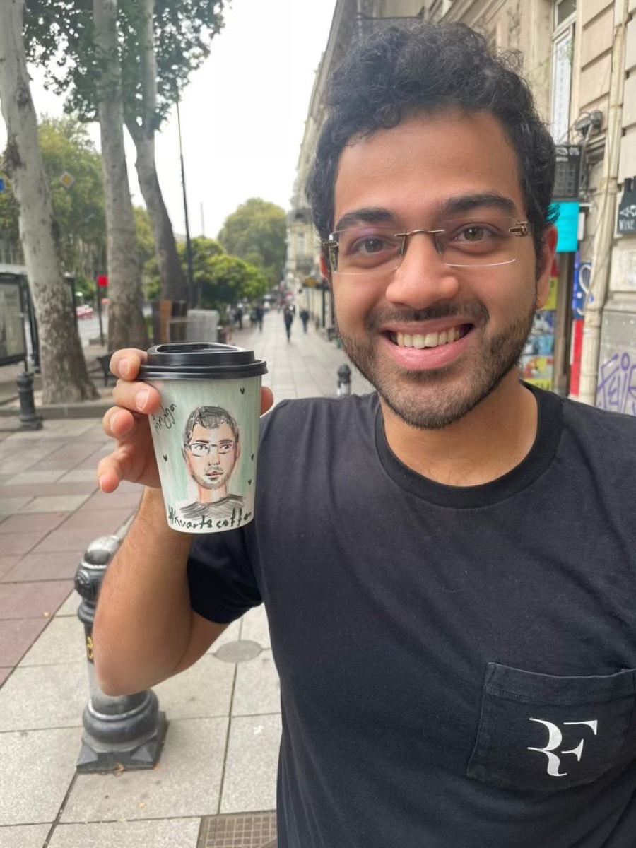 Rohith with two top-knot buns