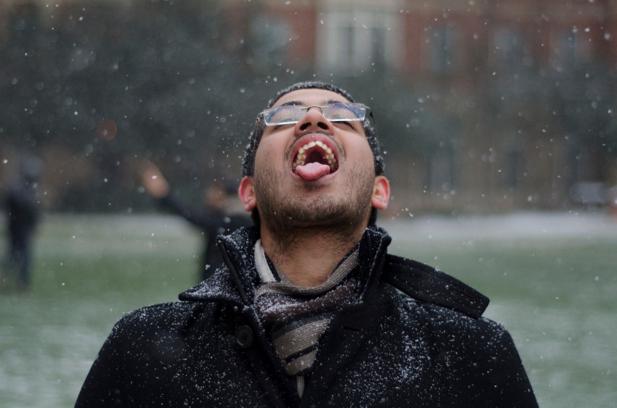 Rohith catching snow on his tongue